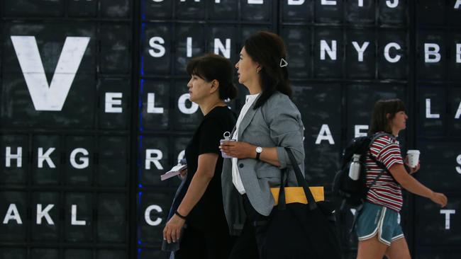 SYDNEY, AUSTRALIA - Newswire Photos JANUARY 02, 2022: People are seen at the Sydney International Airport arrivals terminal, after Australia set new Covid entry rules for travellers entering the country from China. The government is reportedly considering testing plane waste water on affected flights also. Picture: NCA Newswire / Gaye Gerard