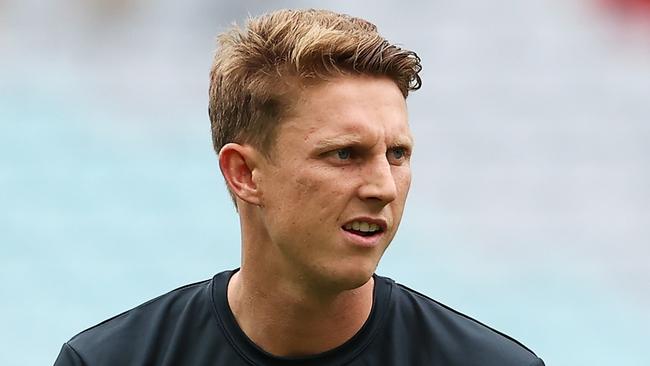 Lachie Whitfield of the Giants walks on field before the round one AFL match between the Greater Western Sydney Giants and the Sydney Swans at Accor Stadium.