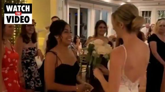 Couple’s engagement at friend’s wedding divides