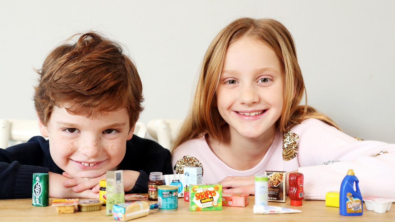 Ava Keating 9 and Billy Keating 5, with the new Coles Mini Collectables. Picture: Tim Hunter.