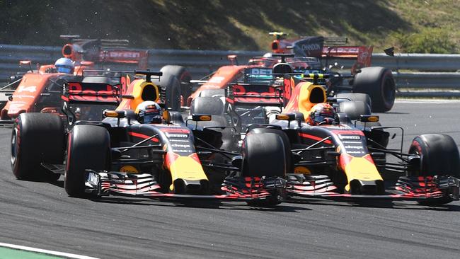 Red Bull's Australian driver Daniel Ricciardo (L) and Red Bull's Dutch driver Max Verstappen (R). Pic: AFP