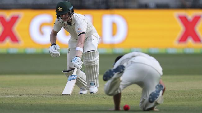 Steve Smith makes his ground as Neil Wagner fumbles. Picture: AP