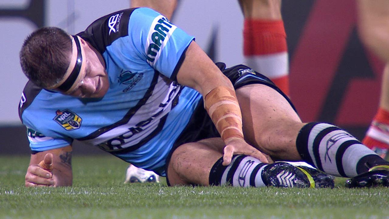 Paul Gallen clutches his injured knee.