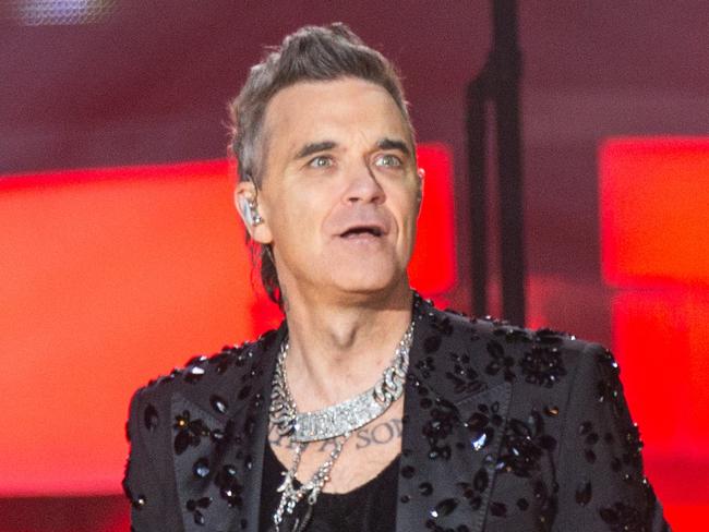 Robbie Williams performs onstage during his first of two shows in Melbourne at AAMI Park on Wednesday, November 22, 2023. Picture: Brett Schewitz