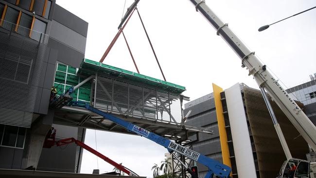 Foot bridge between Cairns Hospital and Liz Plummer Centre being installed in 2013.