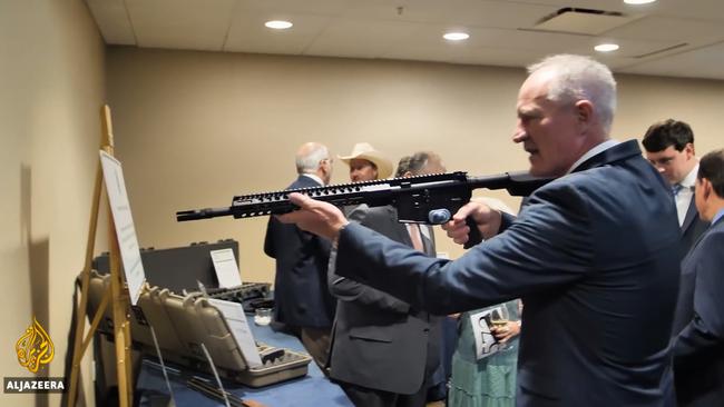 Steve Dickson holding a gun in episode 2 of Al Jazeera's documentary. Supplied