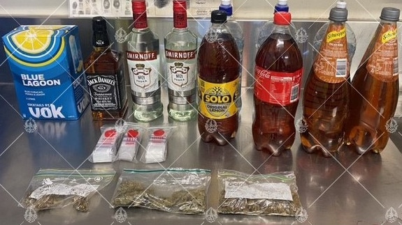 NT Police seized 1.2 kilograms of cannabis and 30 litres of alcohol in total. Picture: NT Police