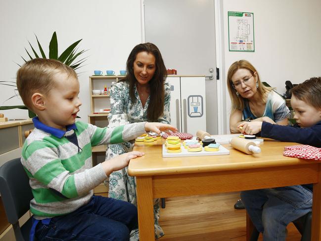 Leo Dever, 3, Woollahra Mayor Susan Wynne, Member for Vaucluse Gabrielle Upton and Alexander MacGillivary, 3, at the new area of Woollahra Preschool at the Hugh Latimer Centre in Double Bay. Picture: John Appleyard