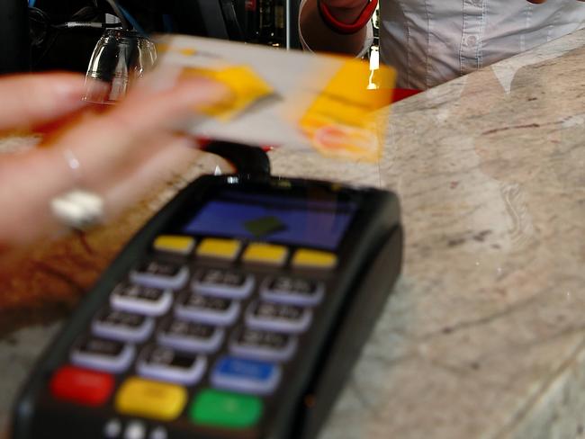 15/7/14 - Barista Jade Lowrey serves a customer take away coffee paid for by paywave - - pic Mike BURTON