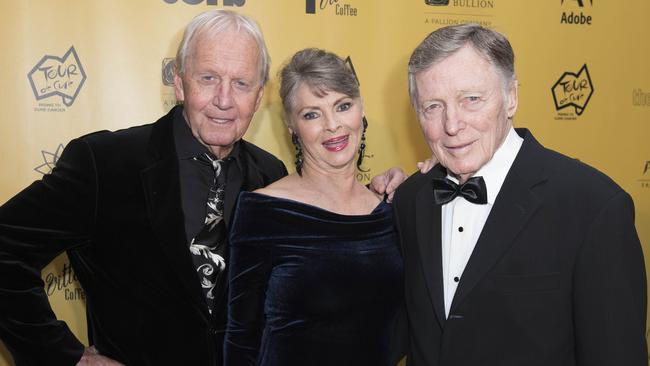 Paul Hogan, Delvene Delaney and John Cornell on the red carpet attending the Tour De Cure Snow Ball at The Star Ballroom Sydney. Picture: Darren Leigh Roberts