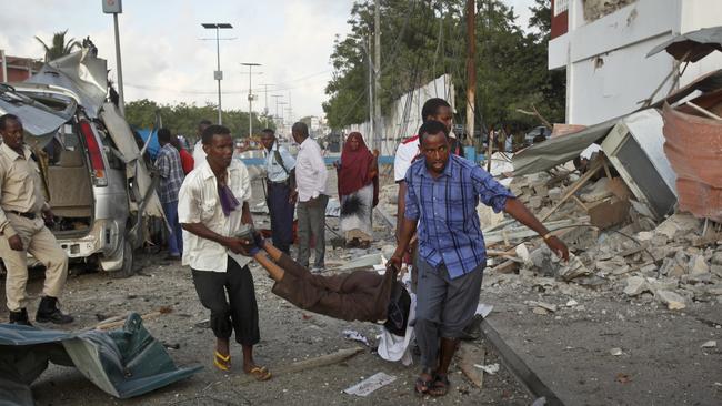 Gunmen blast their way into Somalia hotel, claim lives | news.com.au ...