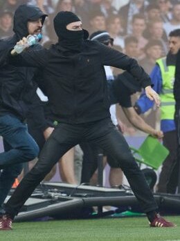 Spectators invade the pitch. Picture: Victoria Police.