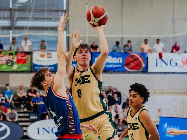 Jacob Furphy goes to work on Serbia in the gold-medal game at the Albert Schweitzer game in Germany.