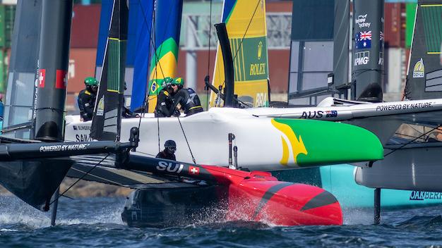 Switzerland in close action with the Australian SailGP team. Picture: Felix Diemer for SailGP.