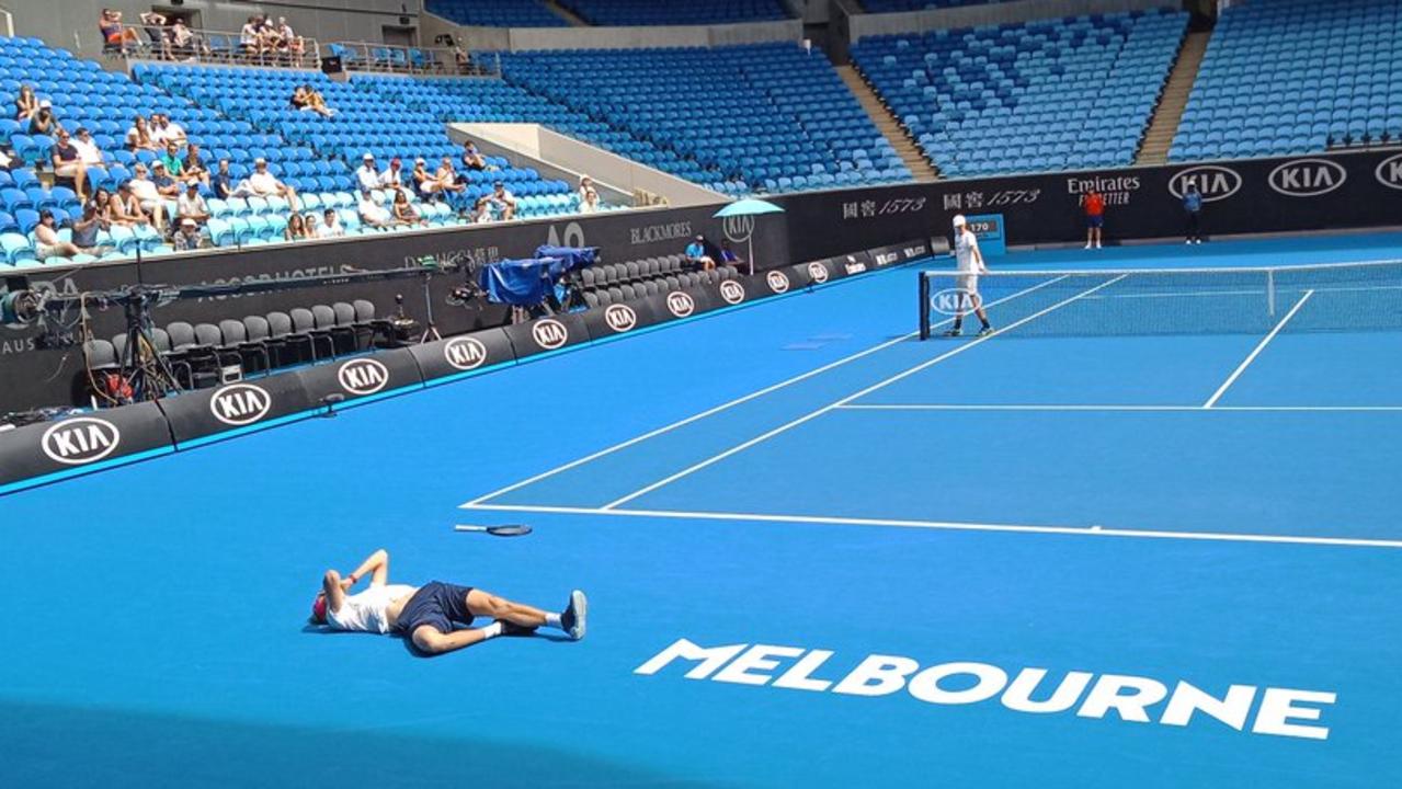 Alexander Zverev lies hurt on the court after appearing to roll his ankle in a practice match ahead of the Australian Open. Photo via @PossiblyGeorge on Twitter