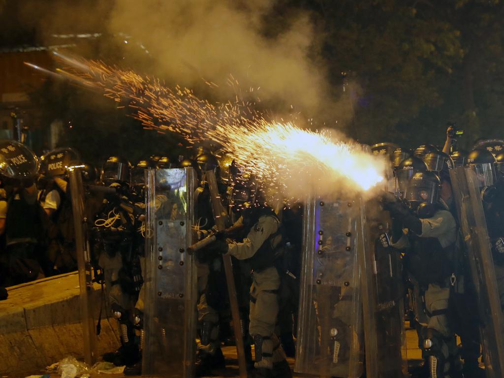 Police fire tear gas on protesters in Hong Kong. Picture: AP
