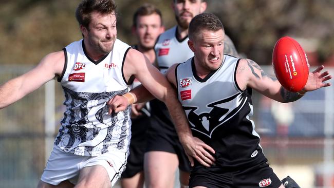 Roxburgh Park skipper Harley Short looks to gather the footy. Picture: Mark Dadswell