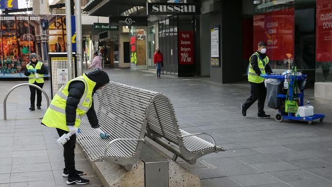 M.Cleaners at work in the Bourke Street Mall. Picture: Ian Currie