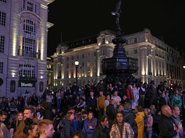 Londoners pause for a National Moment of Reflection for the Queen. Picture: AFP.