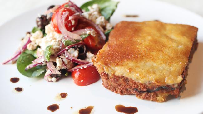 Tasweekend.  Indulge.  Johnston & Miller at the Icon.  Moussaka baked layers of mince, potato, eggplant topped with Bechamel and served with Greek salad.  Picture: NIKKI DAVIS-JONES