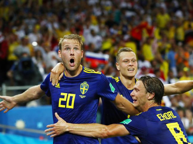 SOCHI, RUSSIA - JUNE 23:  Ola Toivonen of Sweden celebrates with Albin Ekdal (r) after scoring the opening goal during the 2018 FIFA World Cup Russia group F match between Germany and Sweden at Fisht Stadium on June 23, 2018 in Sochi, Russia.  (Photo by Dean Mouhtaropoulos/Getty Images)