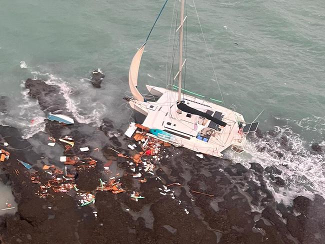 Rescue300 responded to a Trimaran shipwrecked on rocks on South Barron Island. Picture: CapRescue