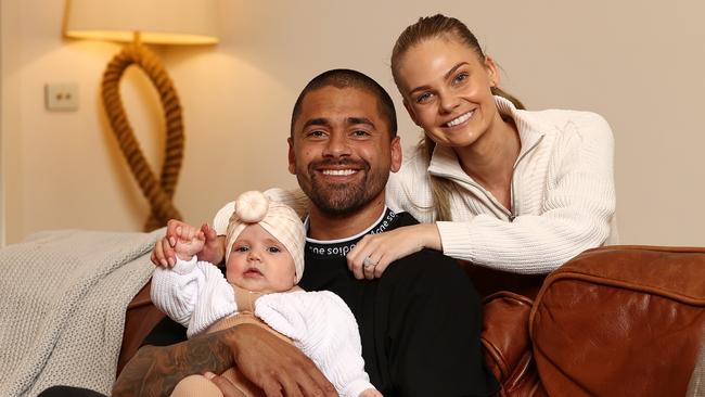 Hill with daughter Harriett and his partner Sam. Picture: Michael Klein