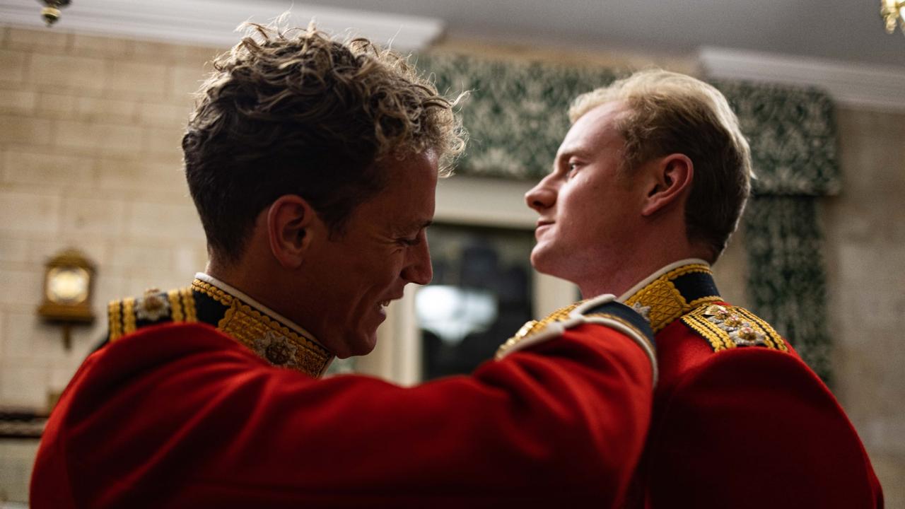 Guards help each other with their uniforms in this behind-the-scenes snap. Picture: UK Ministry of Defence