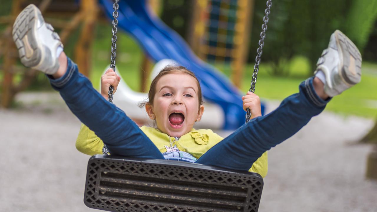 Kids want to take risks and have adventures in parks, with playground equipment like swings ranking high on their wishlists. Picture: iStock