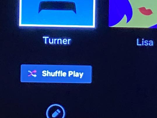 The shuffle play button appearing on a Netflix user's TV. Picture: Twitter / Turner Levison