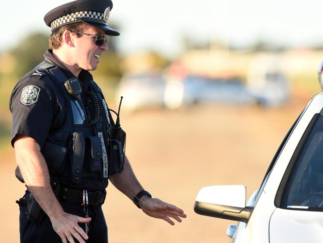 24/09/15 - Police on the scene at Waterloo Corner where a body has been found at the intersection of Mill Road and Short Road.Photo Tom Huntley