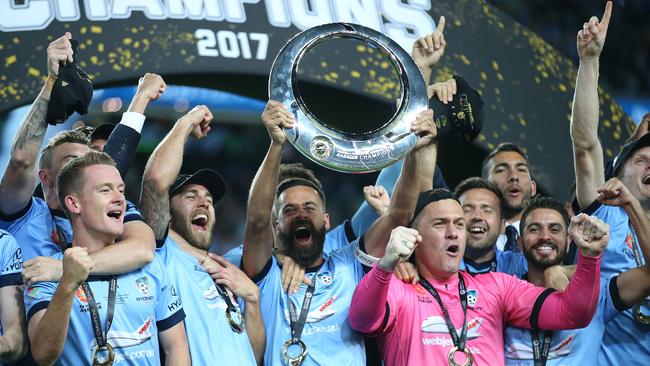 Sydney FC celebrate their A-League grand final victory.