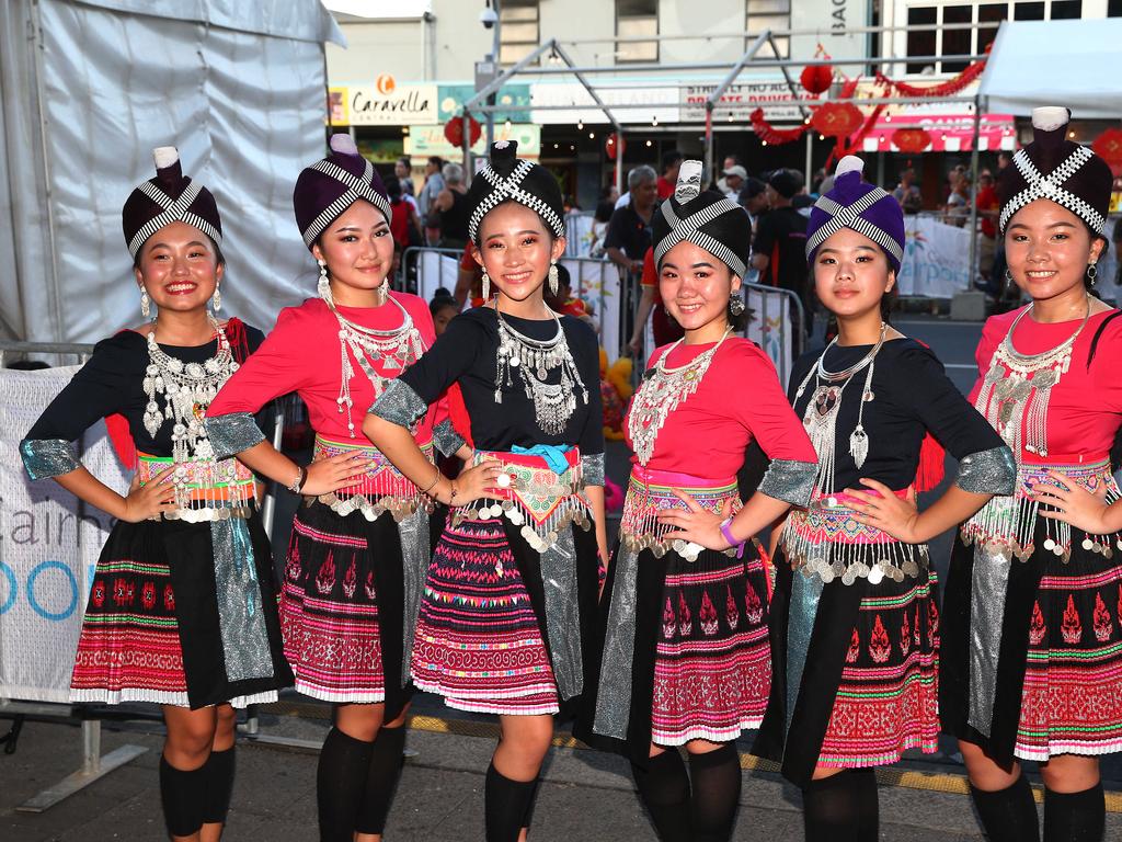 Elizabeth Lee, Pahoua Thao, Kelly Moua, Pachia Moua, Elly Moua and Ia Moua of the Nkauj Hmoob Sunshine dance group from the Hmong Youth Society at the Cairns and District Chinese Association Inc Chinese New Year street festival on Grafton Street. PICTURE: BRENDAN RADKE