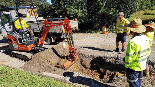 A council crew works on the Tweed Lane road after repeated burst water mains. Picture: Josh Preston