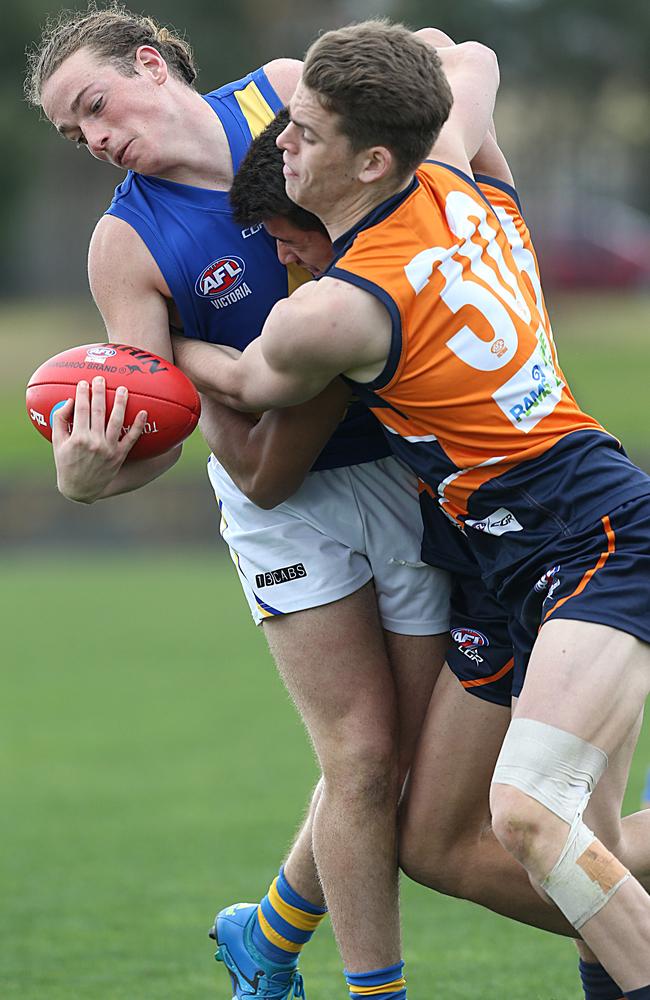 Mitch Podhajski (right) has found his place as a midfielder this year. Picture: Ian Currie.