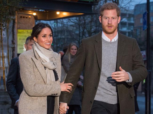 Meghan wearing the Jigsaw scarf. Picture: Dominic Lipinski/AFP