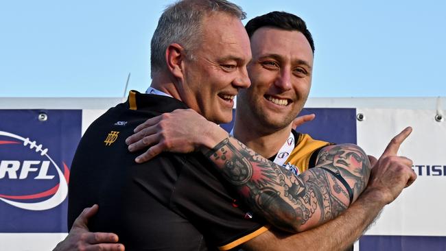 Werribee Districts coach Chris Gilham and captain Daniel Schibeci embrace. Picture: Andy Brownbill