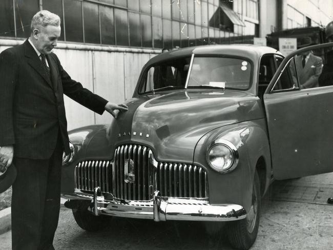 Prime Minister Ben Chifley inspects the 48/215, the very first Holden motor car to come off the assembly line at the plant in Fishermans Bend, Victoria, 29 November 1948. Picture: Herald Sun