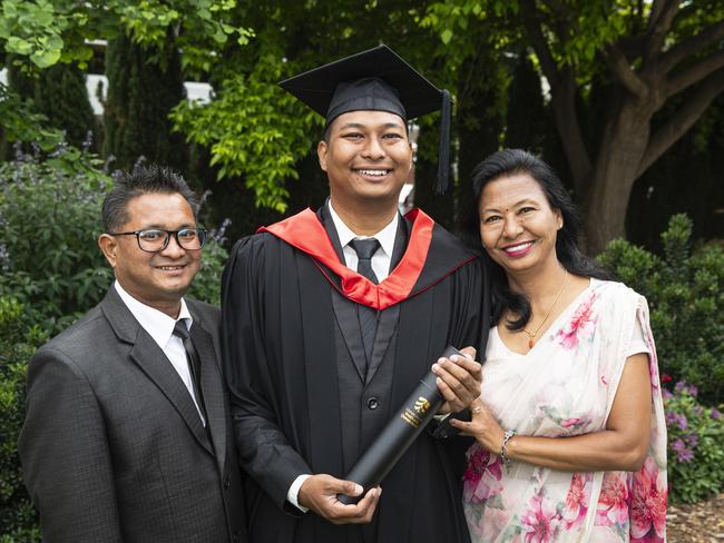 Master of Cyber Security graduate Danyu Rajbahak with dad Dev Kumar Rajbahak and mum Neki Rajbahak at a UniSQ graduation ceremony at The Empire, Wednesday, October 30, 2024. Picture: Kevin Farmer