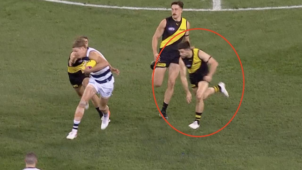 Trent Cotchin launches at Rhys Stanley in the 2019 preliminary final.