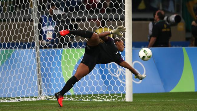 Brazil goalkeeper Barbara saves Alanna Kennedy’s penalty.