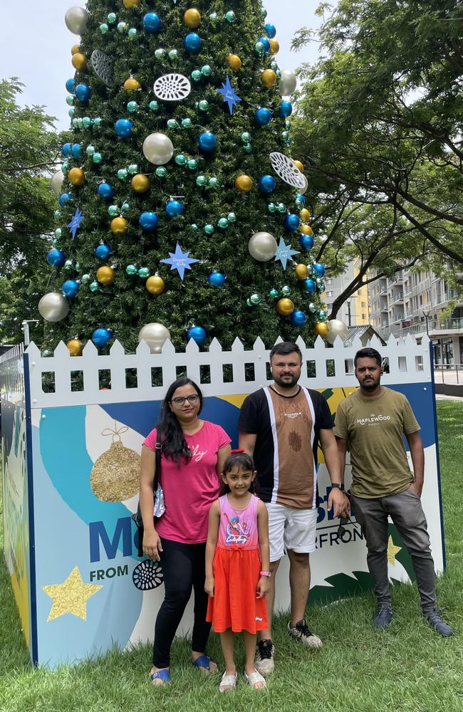 (L-R) Lina, Dhrumi and Asvin Goswami, and Vinay Sheh enjoying Christmas Day at the Darwin Waterfront, 2022. Picture: Annabel Bowles