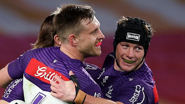 SYDNEY, AUSTRALIA - AUGUST 08: Ryan Papenhuyzen of the Storm celebrates scoring a try during the round 23 NRL match between South Sydney Rabbitohs and Melbourne Storm at Accor Stadium, on August 08, 2024, in Sydney, Australia. (Photo by Brendon Thorne/Getty Images)