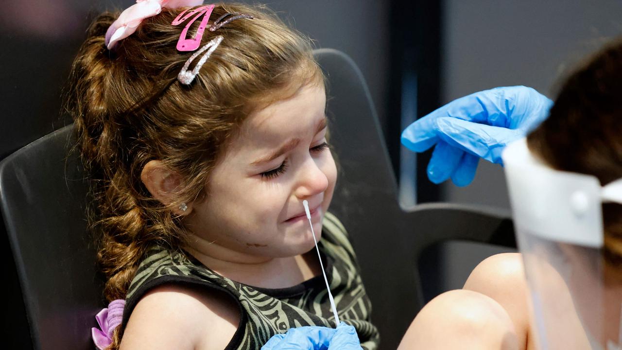 An Israeli child undergoes a Covid test to visit the Lego Space Park. Anyone over three-years-old requires proof of immunity or a negative test. Picture: AFP