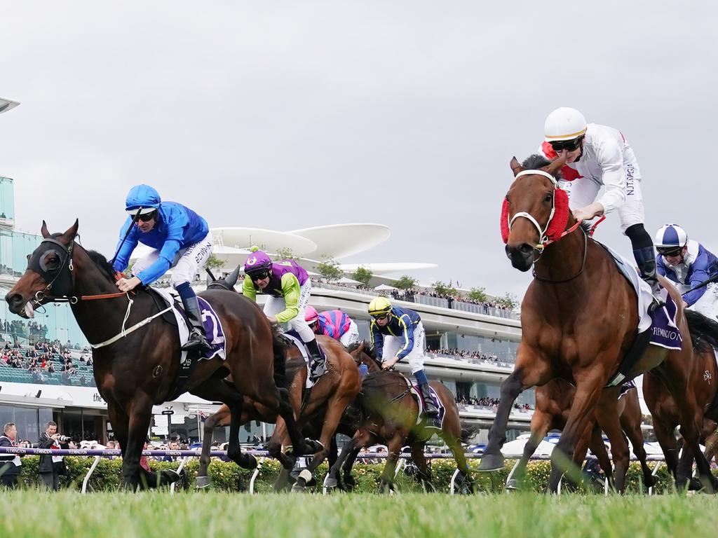 Jamie McDonald and Mandela Effect (right) edge out Rainer (from left) in the first race.