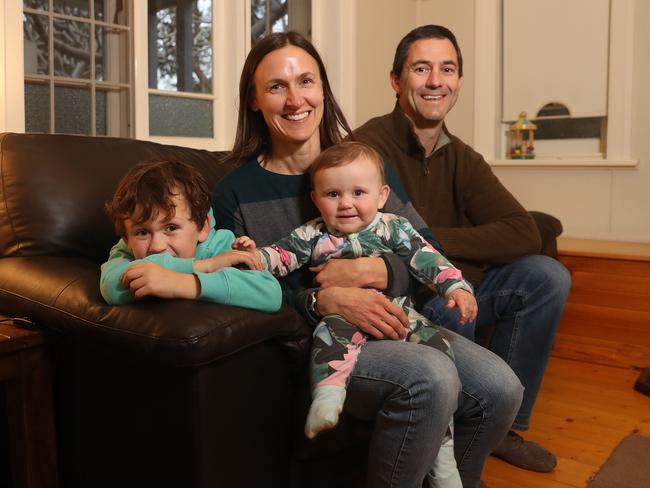 Amanda and Duncan Macaulay with their son Lewis, 6, and daughter Macy, 9 months at home in Woonona. Picture: Brett Costello