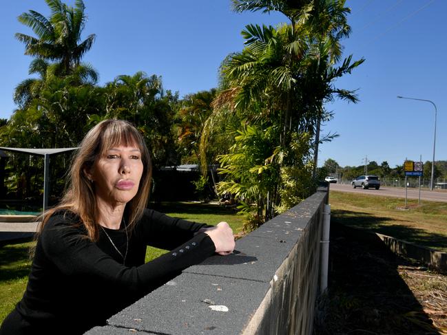 Rhonda Lapish at her Annandale home adjacent to University Drive where tree cover had been cut down. Picture: Evan Morgan