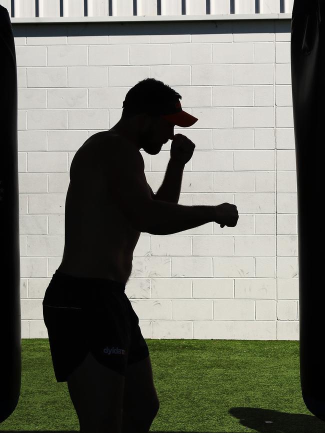 Shane Mumford spars the bag at training last year. Picture. Phil Hillyard