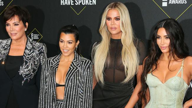 (FILES) In this file photo taken on November 10, 2019 (L-R) Business women/media personality Kris Jenner, Kourtney Kardashian, KhloÃ© Kardashian and Kim Kardashian arrive for the 45th annual E! People's Choice Awards at Barker Hangar in Santa Monica, California. - Fans will have to find another way to keep up with the Kardashians, as the mega-celebrity family announced on September 8, 2020 that their reality show will end next year. "It is with heavy hearts that we've made the difficult decision as a family to say goodbye to Keeping Up with the Kardashians," Kim Kardashian wrote in a post to her 188 million Instagram followers. (Photo by Jean-Baptiste Lacroix / AFP)