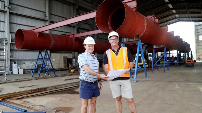 Director of English Engineering Pat English and Experience Co general manager Great Barrier Reef Adam Jones at the Austal shipyard with the pontoon being constructed behind. Picture: Stewart McLean